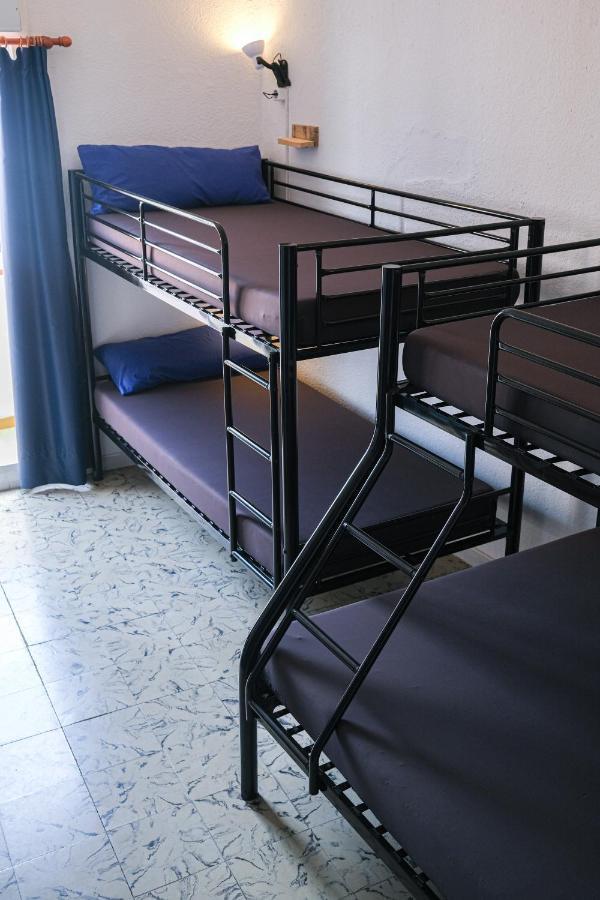 Cama en habitación compartida mixta de 4 camas